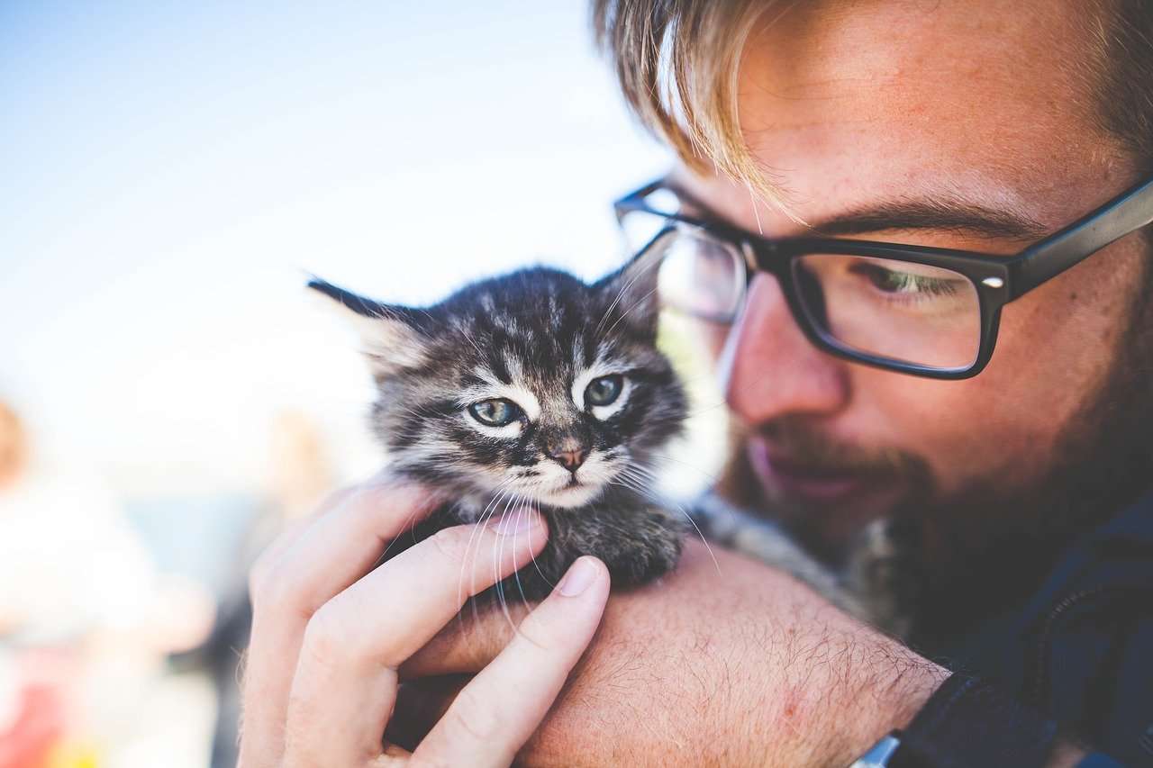 man with kitten